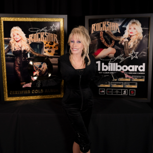 Dolly Parton with Certified Gold Plaque