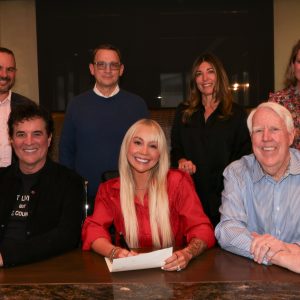 Raelynn_P_SigningPhoto_20250327_EGerlock_BMLGowns_BM2_9357_ColorNFv2_EditJF_FNL